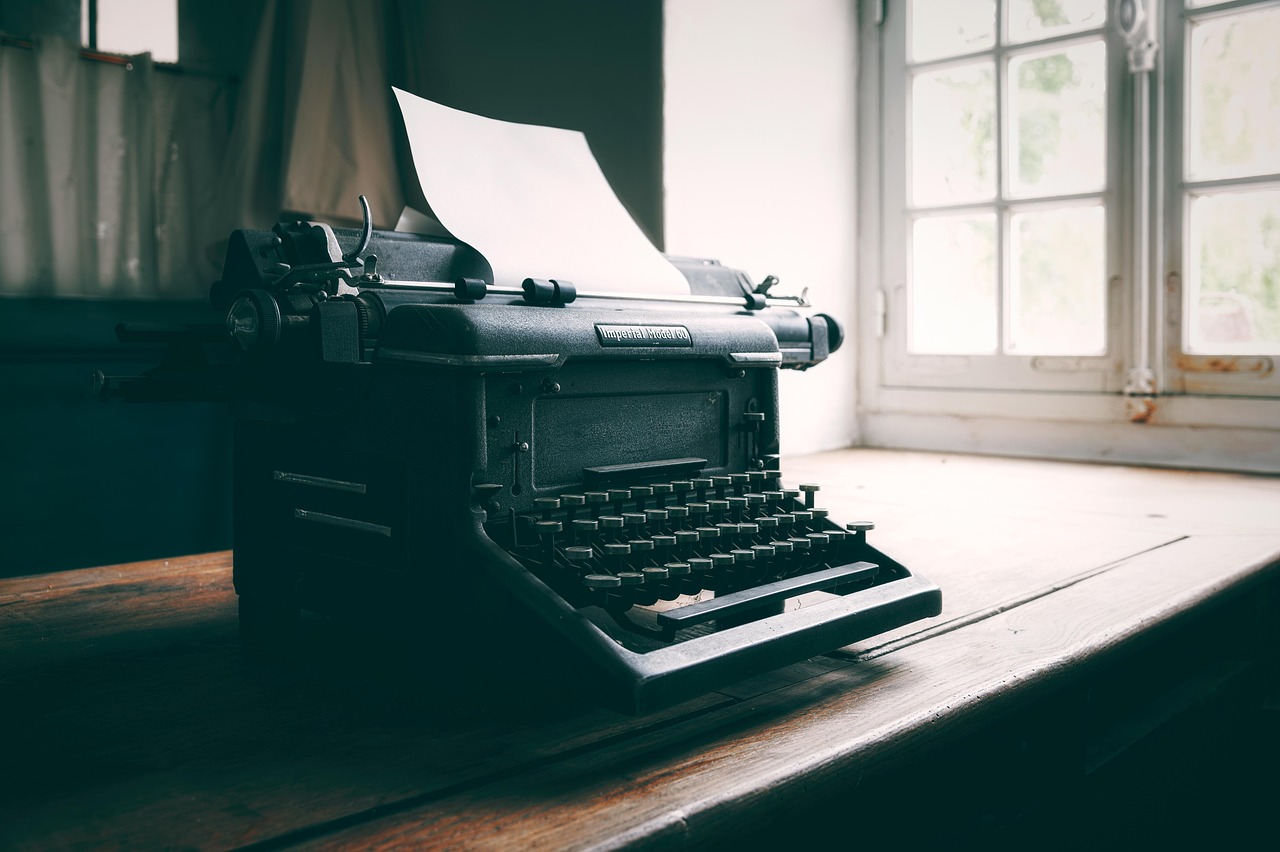 Vintage typewriter used to draft a book description